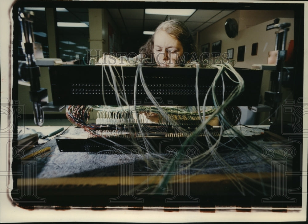 1984 Telect assembler Sue Lautermilch works on digital signal system-Historic Images
