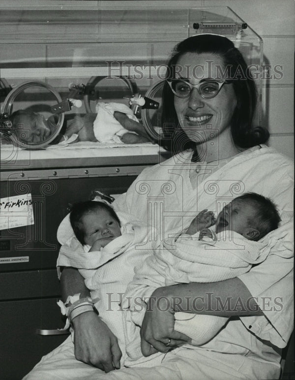 1971 Mrs. Earl Firkins of E13407 Trent, and her triplets Historic Images