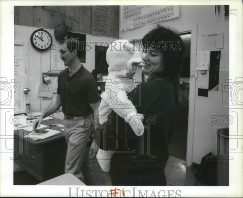 1990 Karma and Jim Goodwin with baby Kaprina in Northport School-Historic Images