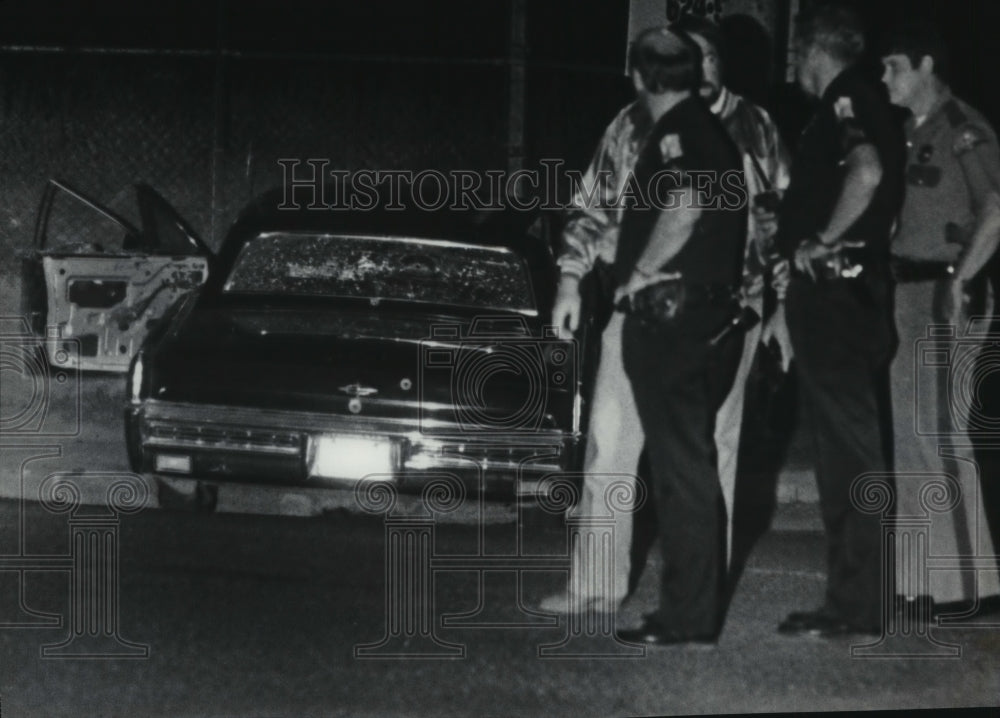 1983 Washington Policemen with car after shoot out-Historic Images