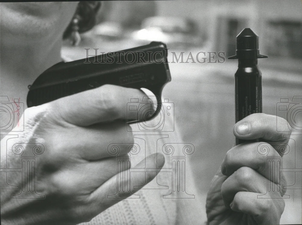 1976 Teargas gun and canister Historic Images