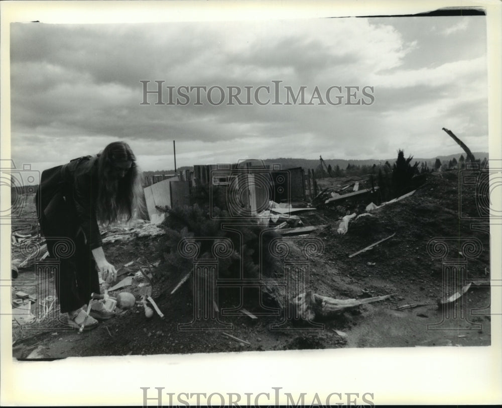Mt. Saint Helens, woman looks through debris and wreckage-Historic Images