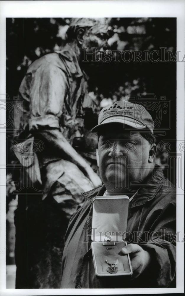 1994 Veteran Dan Gerst Holding His Purple Heart Medal In Spokane - Historic Images
