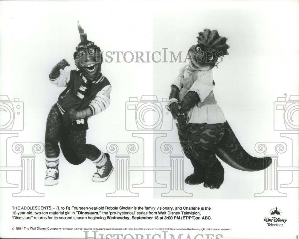 1991 Press Photo Robbie and Charlene Sinclair on Dinosaurs, on ABC. - Historic Images