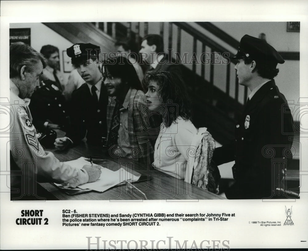 1989 Press Photo Cynthia Gibb and Fisher Stevens star in Short Circuit 2. - Historic Images