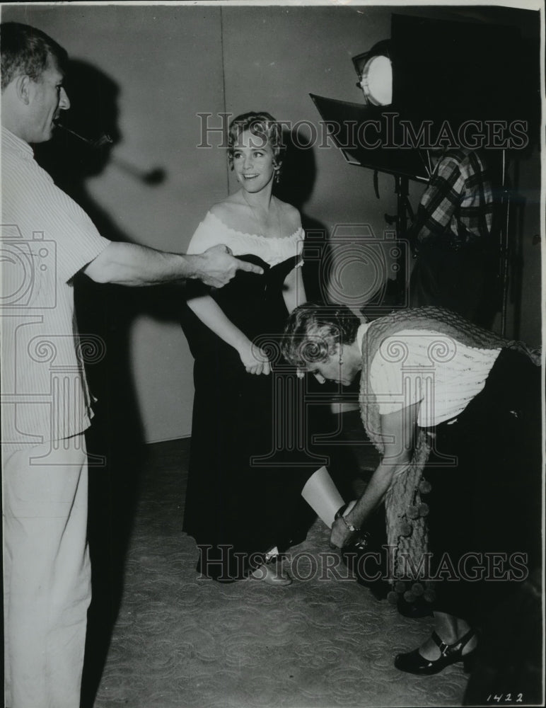 1958 Actress getting help with shoes-Historic Images