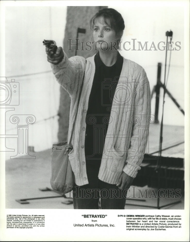 1988 Press Photo Debra Winger in a scene from Betrayed. - Historic Images