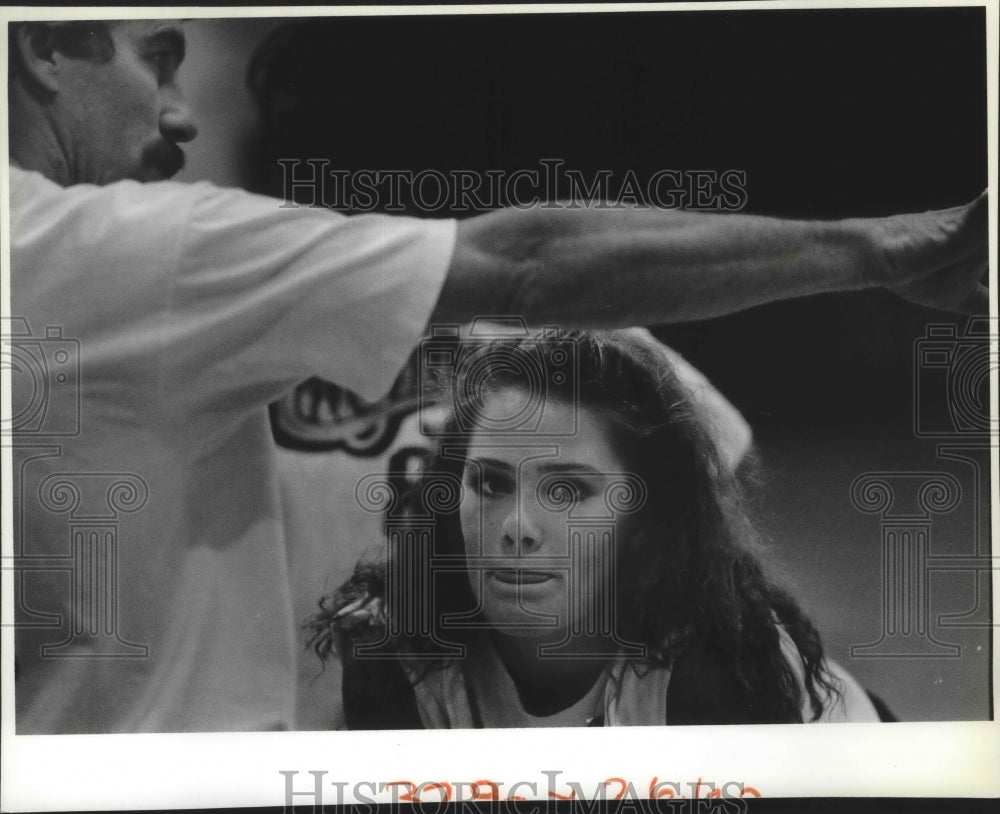 1992 Sara Asbury listens to East Valley volleyball coach Mike Smith - Historic Images