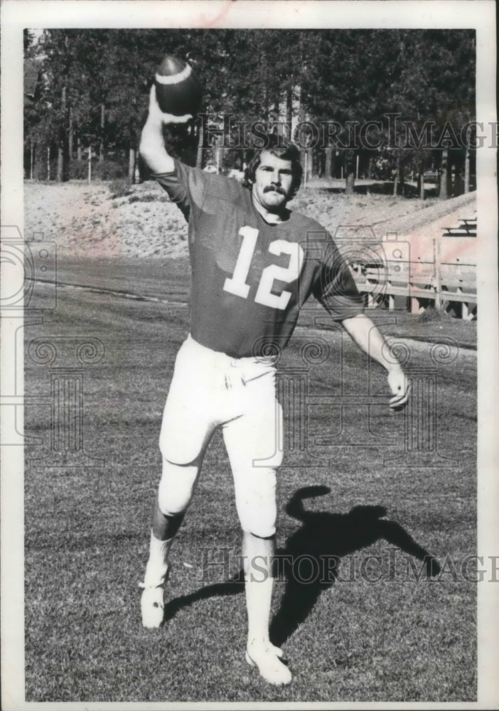 1973 Quarterback Bruce Cole readies to throw  - Historic Images