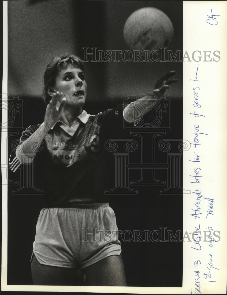 1984 Volleyball player Leslie Ahrendt concentrates on the serve - Historic Images