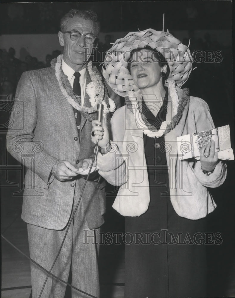 1958 Coach and Mrs. Jack Friel gifted with a trip to Hawaii - Historic Images