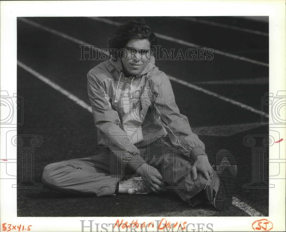 1990 Press Photo Nathan Davis-Track Athlete at Mead High School Stretches - Historic Images