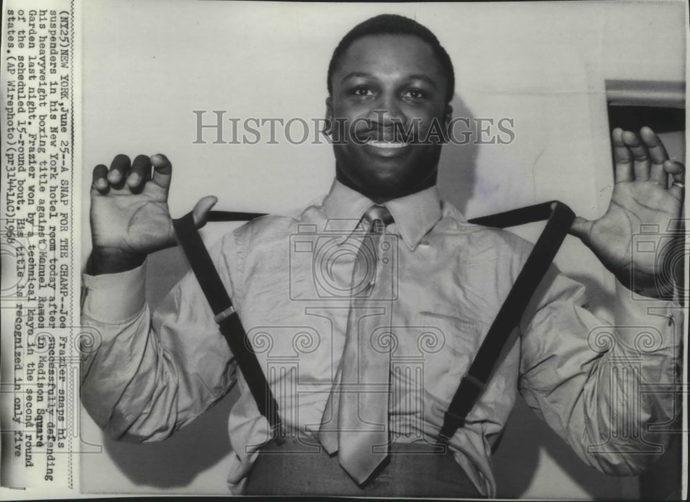 1968 Press Photo Joe Frazier-Heavyweight Boxing Champion Snapping Suspenders- Historic Images