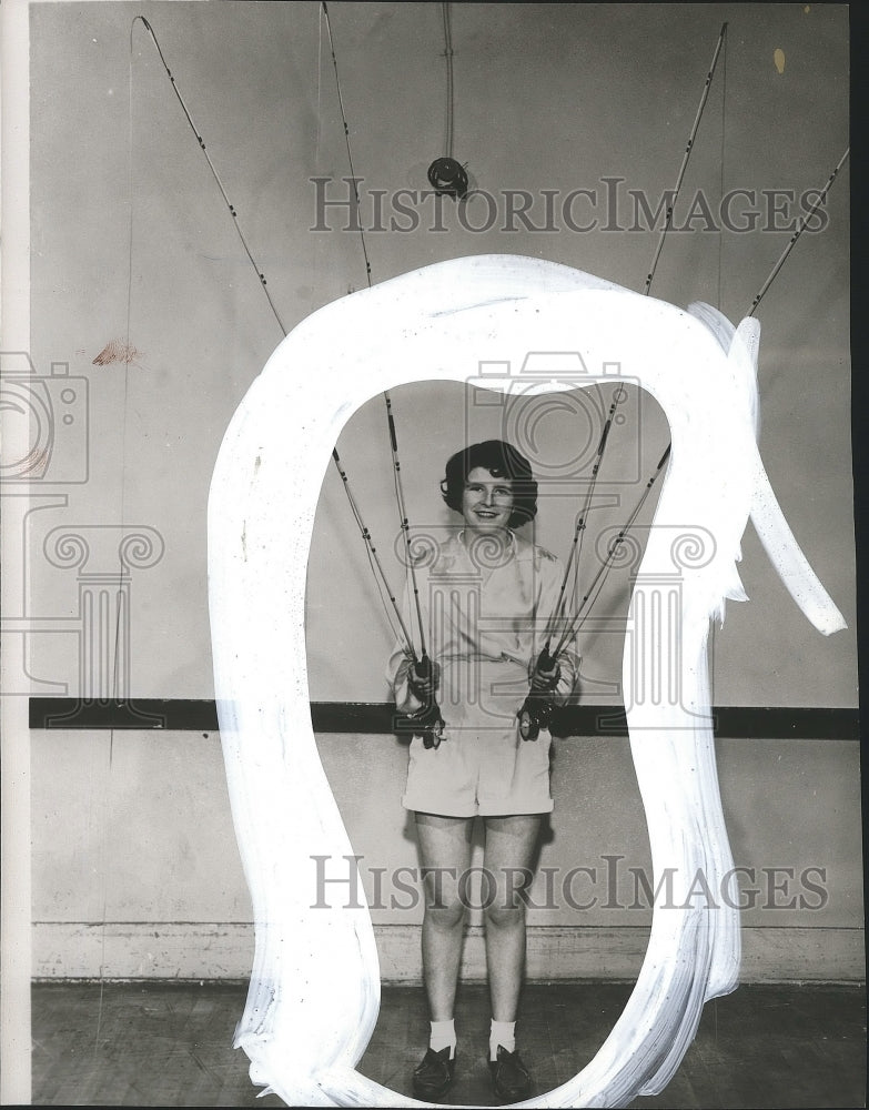 1955 Press Photo Patsy Hubbard &amp; her fishing rods featured at Sports Show - Historic Images