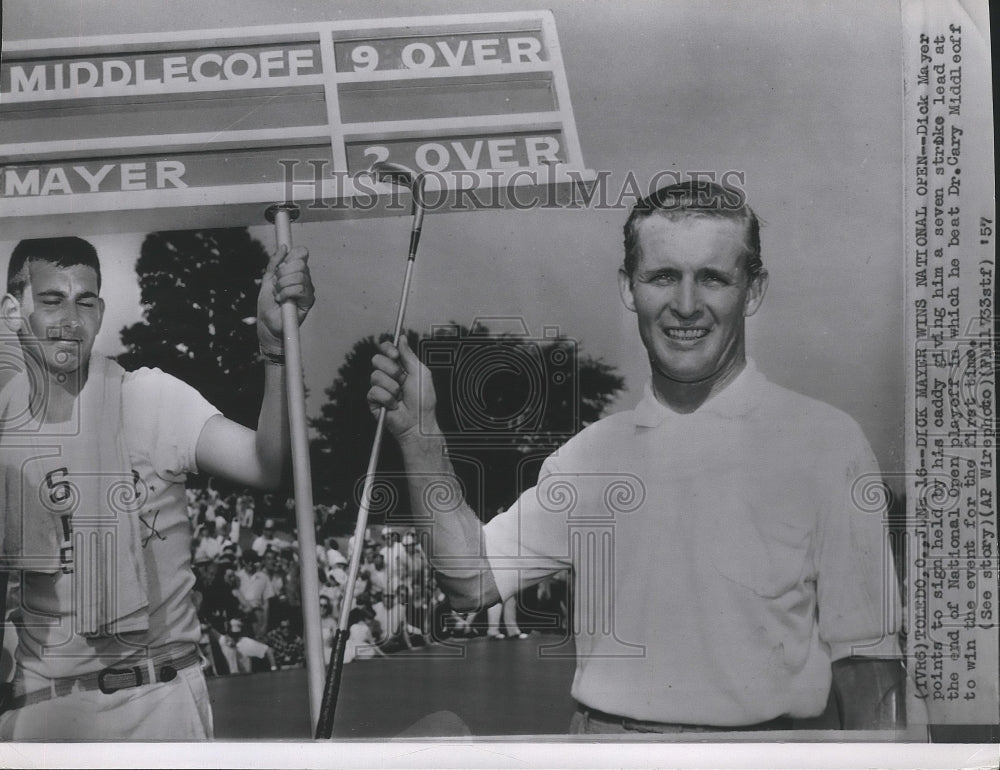 1957 Press Photo Golfer Dick Mayer points to sign held by his caddy - sps08367-Historic Images