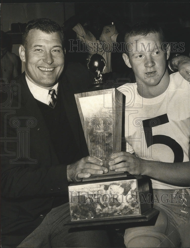 1966 Press Photo Don Martin With Football Trophy in Locker Room - sps09199 - Historic Images