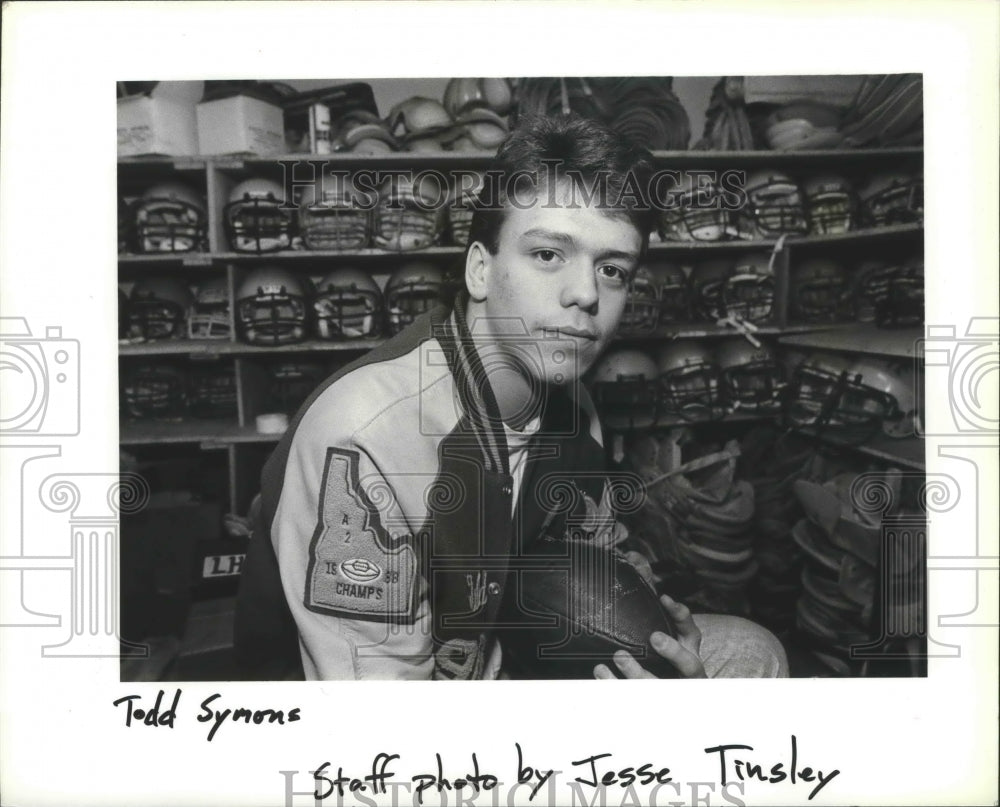 1989 Press Photo Todd Symons Holds a Football and Wears His Letterman Jacket - Historic Images