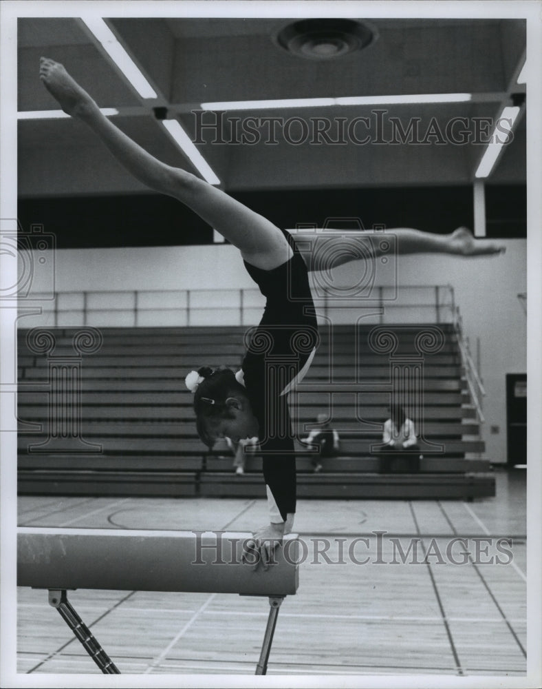 1978 Colorado Olympic hopeful,Connie Urich, performs on balance beam - Historic Images