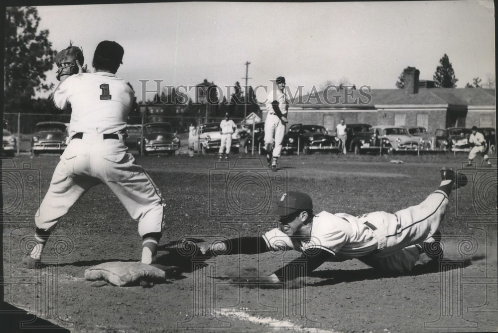 1956 GSL softball player slides to base - Historic Images