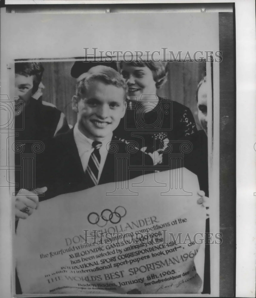 1955 Press Photo Swimmer Don Schollander holding Olympic award banner - Historic Images