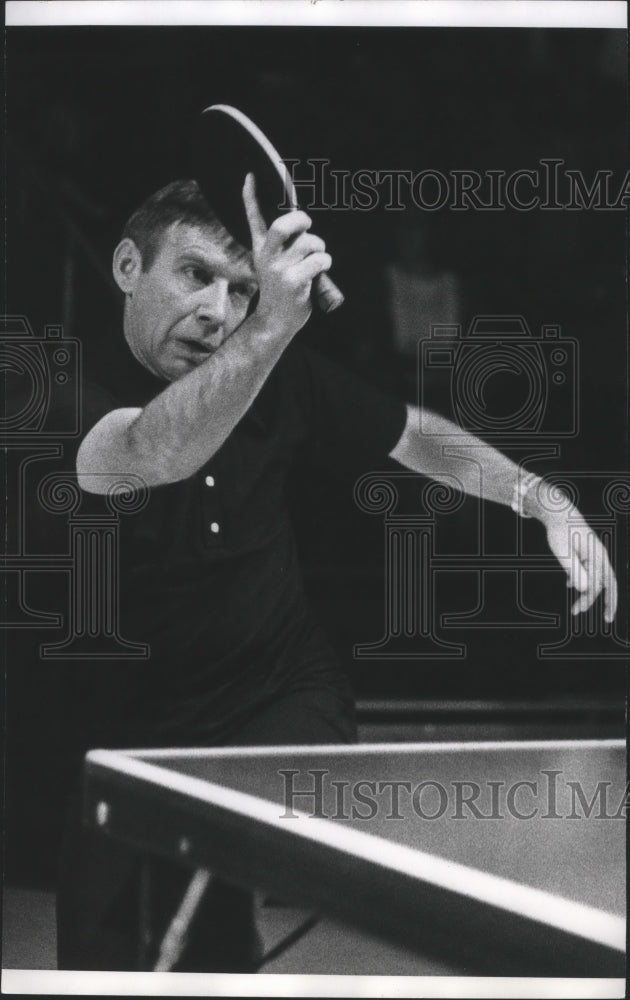 1974 Press Photo Charles E. Cain making a table tennis shot - sps15599-Historic Images