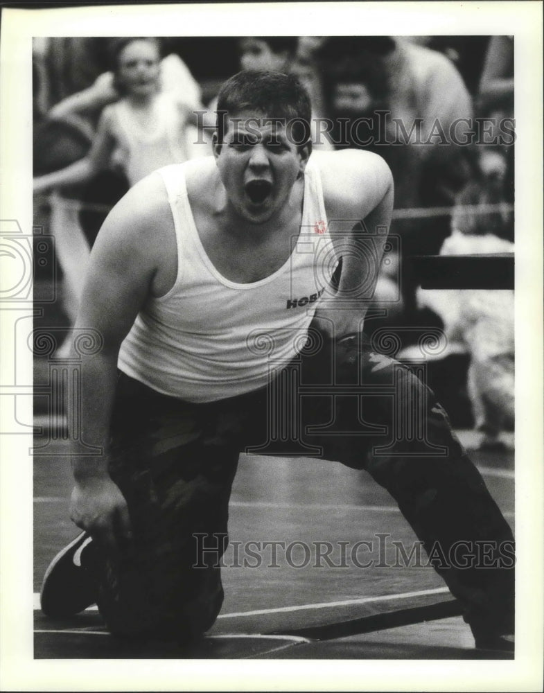 1990 Press Photo Bryan Skirks Yells during Wrestling Match - sps15608- Historic Images