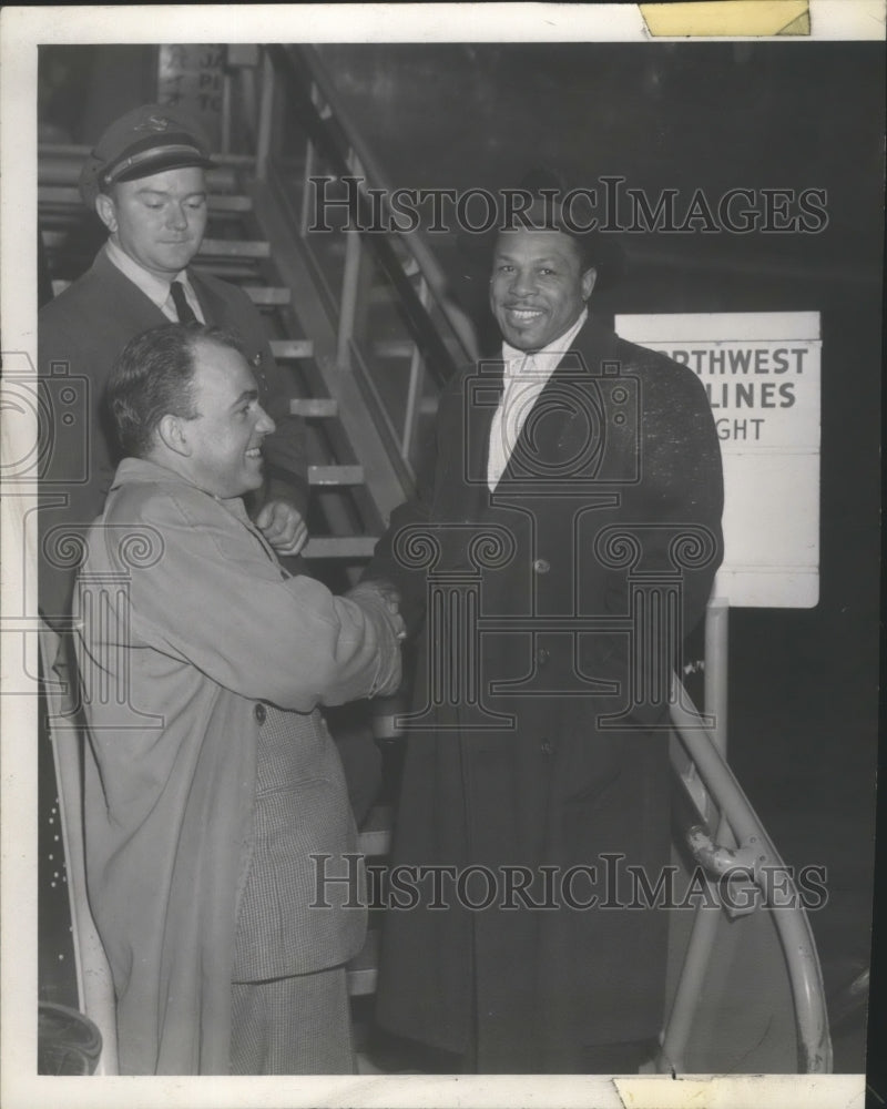 1953 Press Photo Archie Moore shaking hands - sps15761-Historic Images