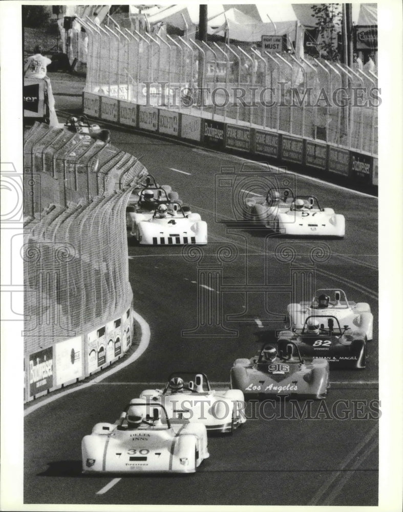 1987 Press Photo Road racing cars turn laps at the 1987 Spokane Grand Prix - Historic Images