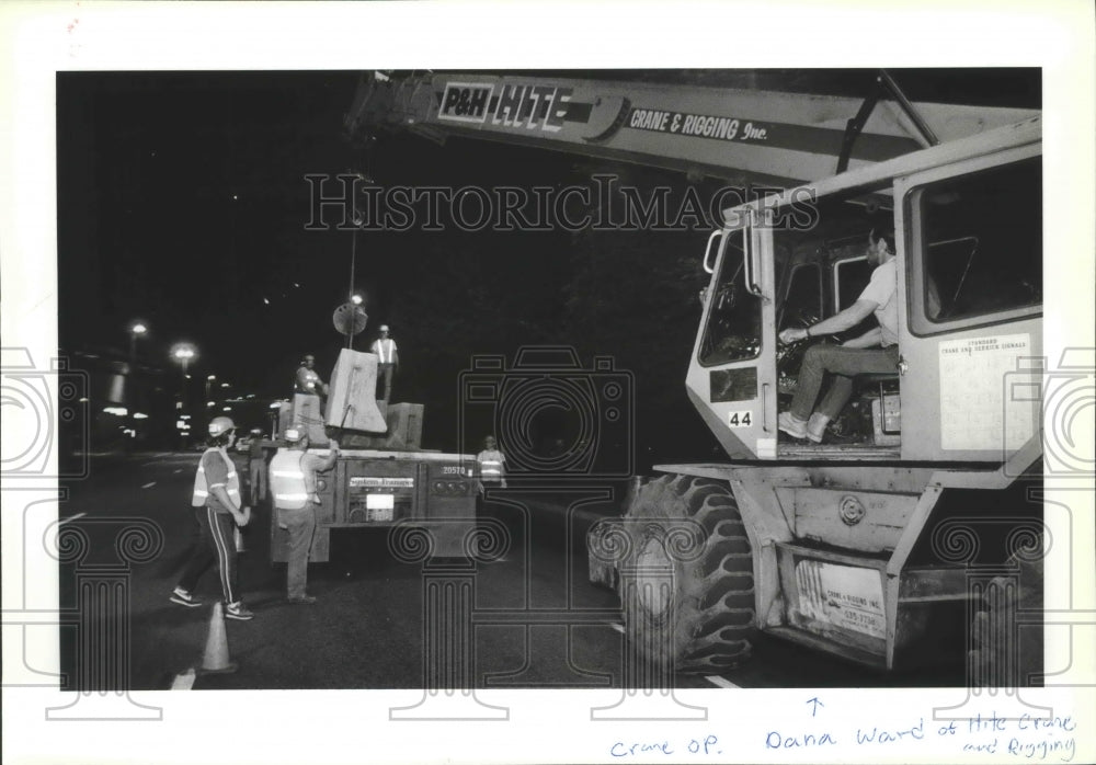 1988 Press Photo Spokane Grand Prix crews install concrete barriers downtown - Historic Images
