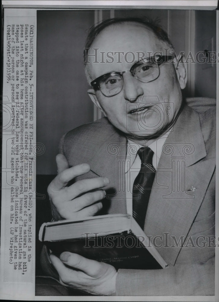 1956 Wire Photo Francis Case poses in his home after the FBI investigation - Historic Images