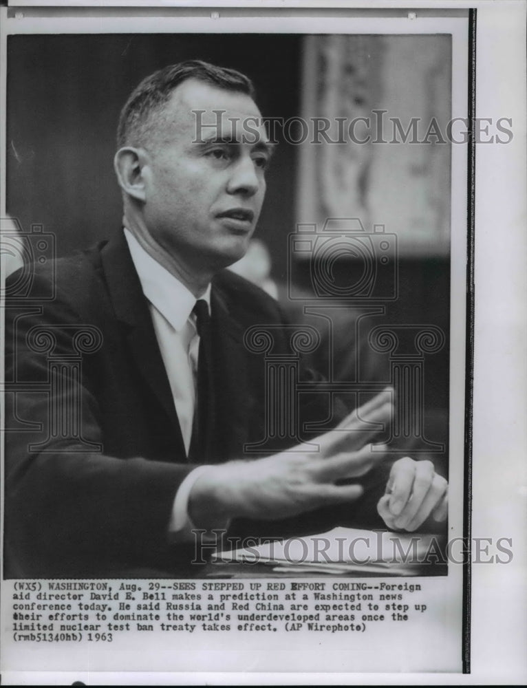 1963 Wire Photo David Bell, Foreign aid director speaks at a news conference - Historic Images