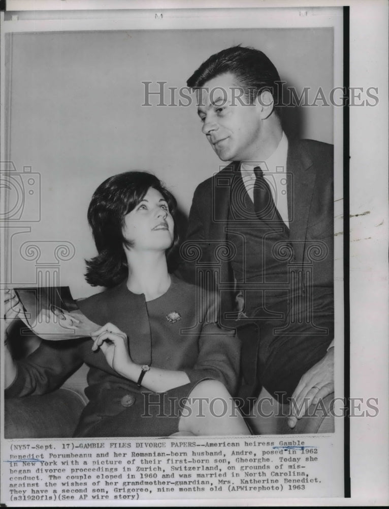 1963 Wire Photo Gamble Benedict Porumbeanu poses with Andre and son&#39;s photo - Historic Images