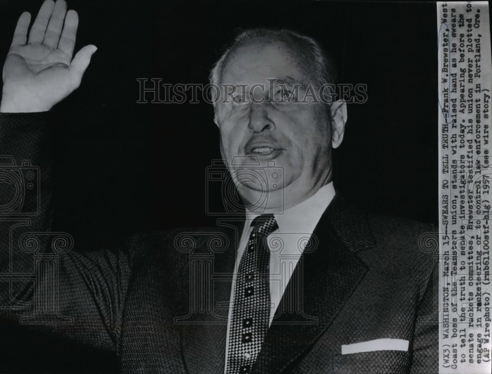 1957 Wire Photo F. Brewster swearing to tell the truth to senate investigators - Historic Images