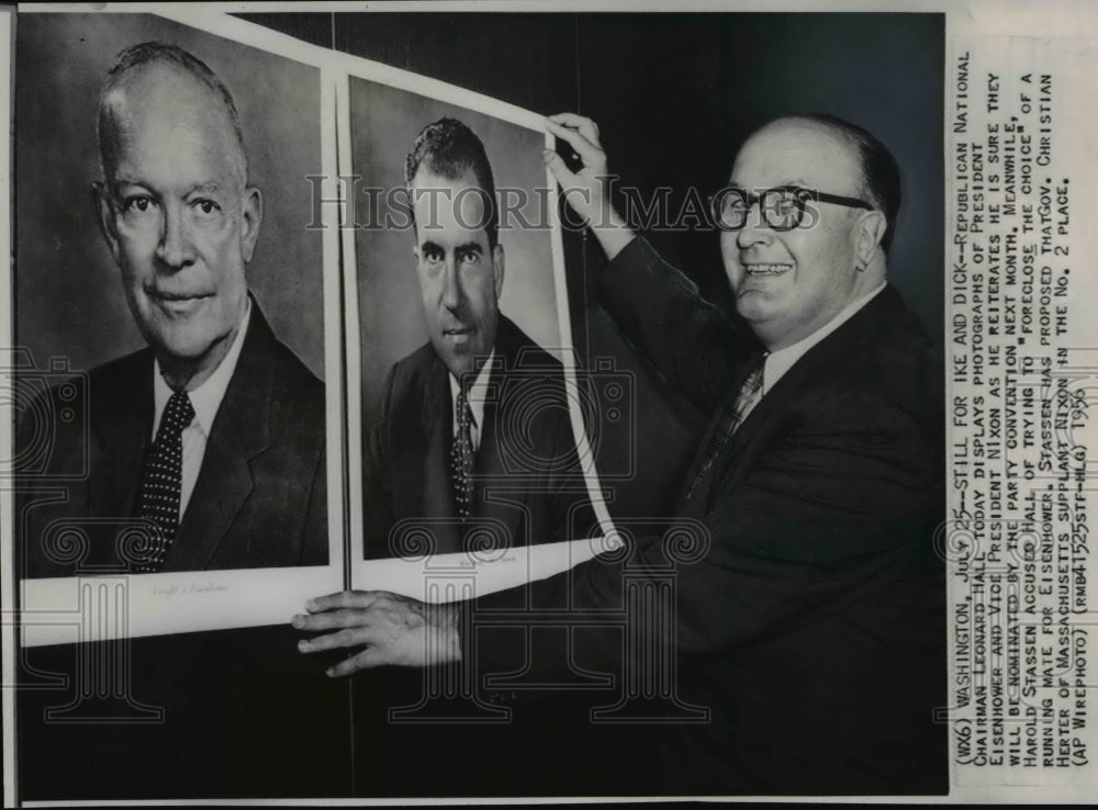 1956 Wire Photo L. Hall displays photographs of Pres. Eisenhower and VP Nixon - Historic Images