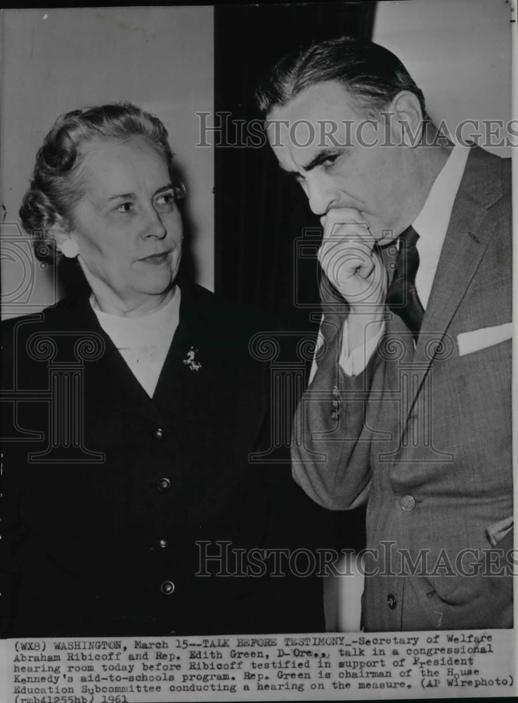 1961 A. Ribicoff and Rep. Green at a congressional hearing room - Historic Images