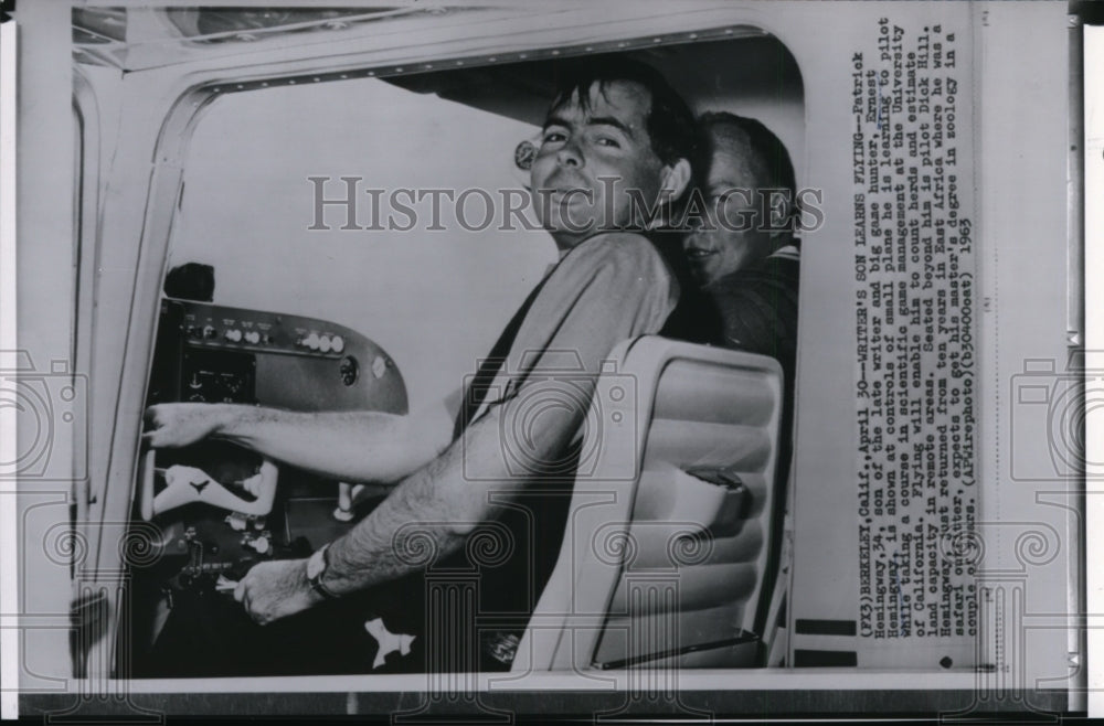 1963 Wire Photo Patrick Hemingway at the controls of a small plane in Berkeley - Historic Images