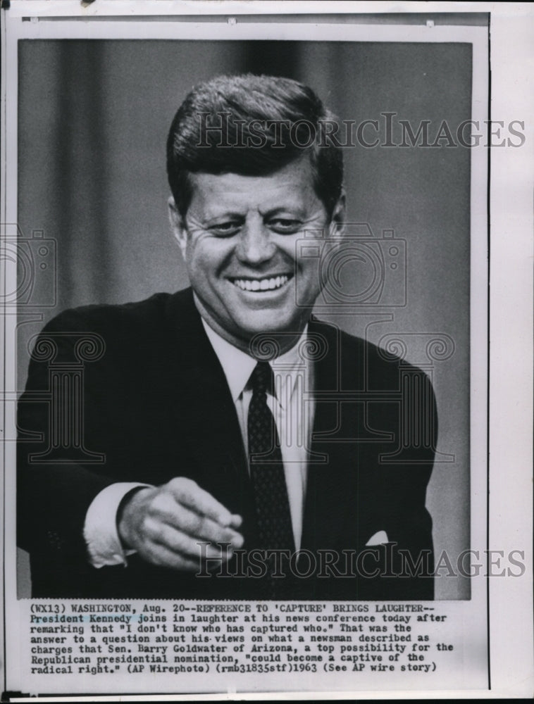 1963 Wire Photo Pres. Kennedy laughing with reporters at his news conference-Historic Images