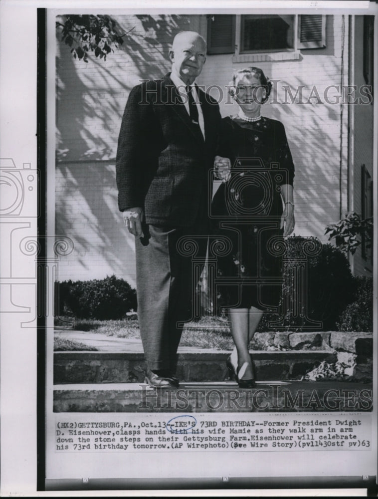 1963 Press Photo President Eisenhower, clasps hands with his wife Mamie. - Historic Images