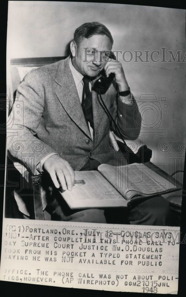 1948 Press Photo Supreme Court Justice William O. Douglas talking on the phone - Historic Images