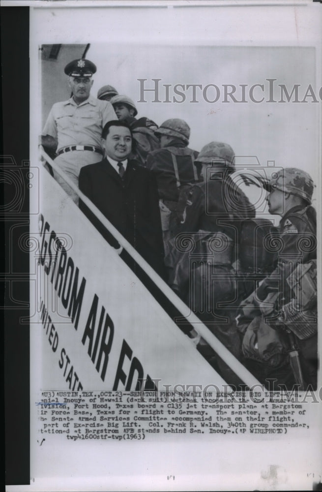 1963 Press Photo Daniel Inouye watching troops board a C135 jet transport plan - Historic Images