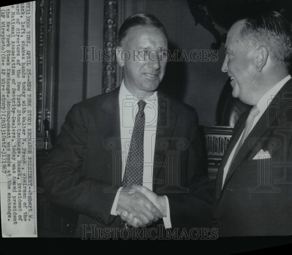 1967 Press Photo Robert W. Haack, shakes hands with Walter M. Frank. - Historic Images