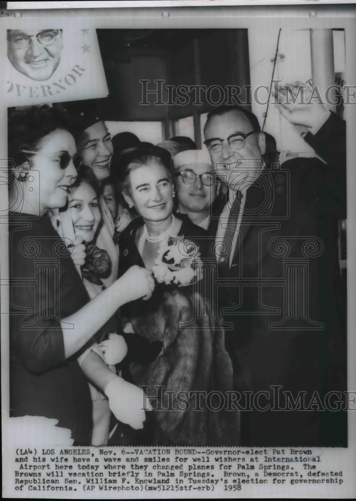 1958 Press Photo Governor elect Pat Brown and his wife at International Airport. - Historic Images