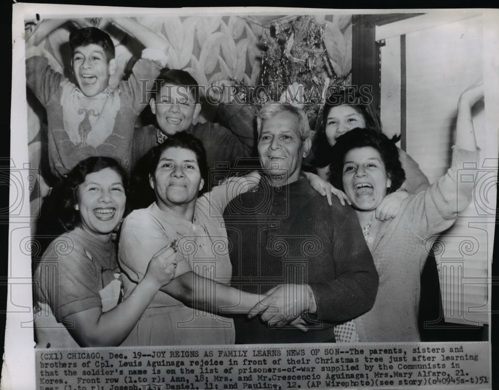 1951 Press Photo Cpl. Louis Aguinaga&#39;s family posing with joy - Historic Images