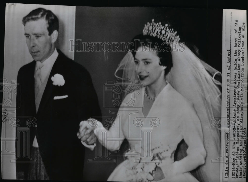 1960 Antony Armstrong-Jones holds the hand of Princess Margaret - Historic Images