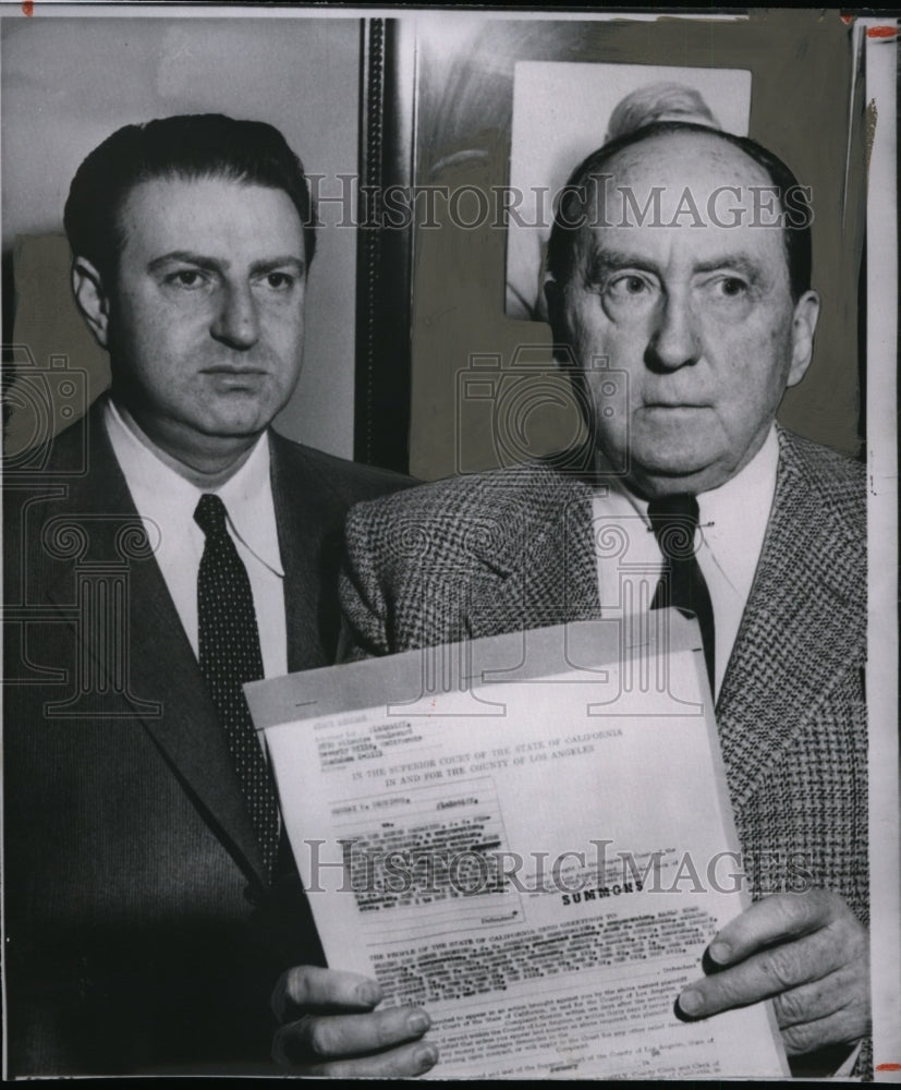 1956 Press Photo Atty. Jerry Giesler holds libel complaint for Chotiner - Historic Images