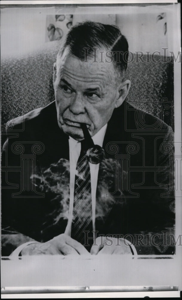 1965 Lieutenant General Lewis B. Puller smoking in Saluda, Virginia - Historic Images