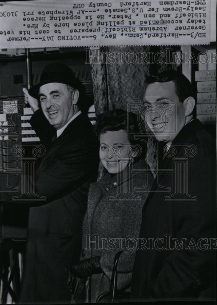 1962 Press Photo Former Governor Abraham Ribicoff with wife casting his vote - Historic Images