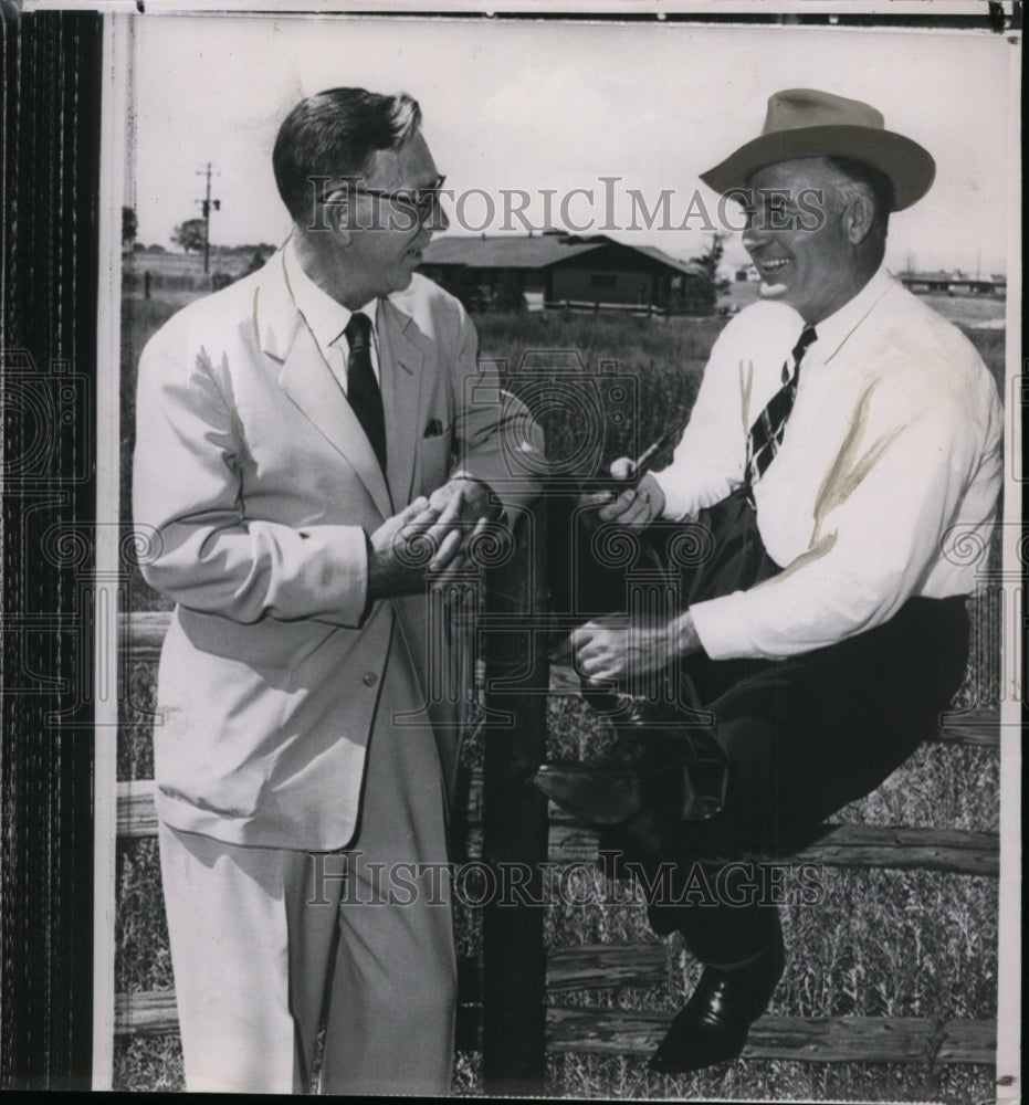 1956 Governor of Colorado, Dan Thornton, chats with a friend - Historic Images