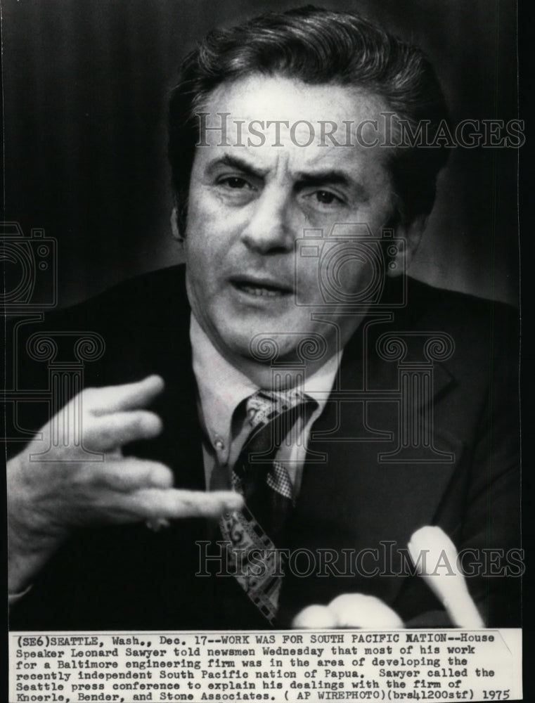 1975 House Speaker Leonard Sawyer speaks to news men in Seattle - Historic Images