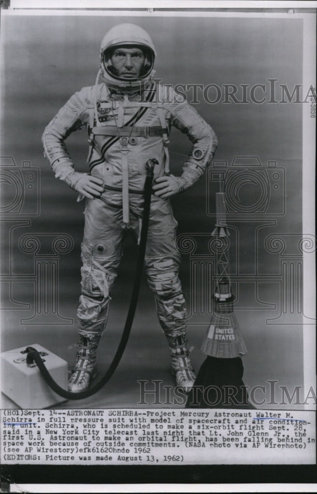 1962 Astronaut Walter M. Schirra posing in his full pressure suit - Historic Images